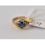 A DIAMOND SAPPHIRE RING, 18ct, size P, 4.2 g.