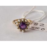 A amethyst and pearl cluster ring 9ct size O 2.7 gms