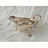 A Victorian cream boat with leaf caped handle, 5" wide, London 1891, 105g