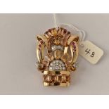 Art Deco dress clip in 18ct gold set with diamonds, rubies & topaz,