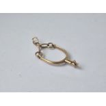 Articulated stirrup gold charm