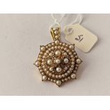 A VICTORIAN HIGH CARAT PEARL AND DIAMOND PENDANT BOXED