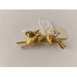 A VICTORIAN NOVELTY RUNNING HARE BROOCH WITH RUBY EYES 18CT GOLD 11.4 GMS