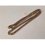 A VERY LONG VICTORIAN GUARD CHAIN 9CT 62 INCH 38.6 GMS