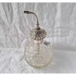 A silver mounted atomizer on cut glass base, 7” high