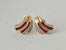 A pair of boxed ruby and diamond earrings 9ct 3.8 gms