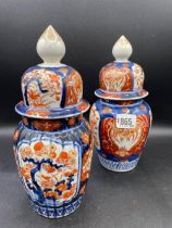 A pair of Imari jars and covers 9 inches
