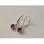 A pair of boxed white gold amethyst drop earrings 9ct 1.9 gms