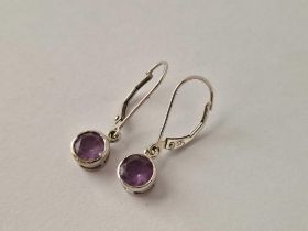A pair of boxed white gold amethyst drop earrings 9ct 1.9 gms
