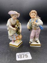 A pair of Meissen figures of guardians on square bases 4 inches high