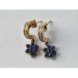 A pair of sapphire and diamond daisy head earrings 3.4 gms