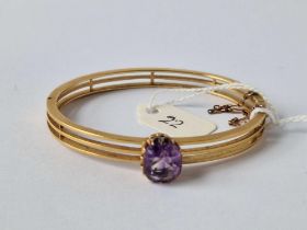 A AMETHYST SET BANGLE 18CT GOLD 21.6 GMS