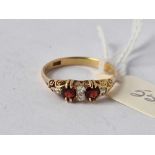 A Edwardian garnet and diamond ring 18ct gold size Q 2.8 gms