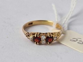 A Edwardian garnet and diamond ring 18ct gold size Q 2.8 gms