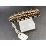 A unusual antique silver studded bangle