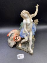 A continental porcelain group of Andromeda and Monster 8 inches