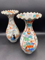 A pair of Japanese vases with fan shaped tops 10.5 inches high