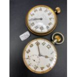 Two large metal eight day pocket watches one with seconds dial and one by Goldsmiths and