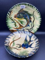 Two continental pottery plates decorated with fish 8 inches diameter