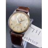 A gents stainless steel OMEGA wrist watch engraved 1955 to reverse with seconds sweep and leather