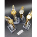 Four ladies wrist watches with metal straps