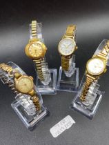 Four ladies wrist watches with metal straps