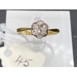 A Edwardian diamond cluster ring 18ct gold and platinum size Q 2.1 gms