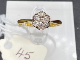 A Edwardian diamond cluster ring 18ct gold and platinum size Q 2.1 gms