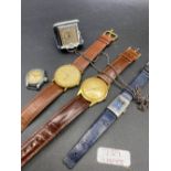 A folding traverlling watch ladies OMEGA wrist watch AF and three others