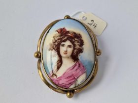 A Victorian porcelain panel gilt brooch