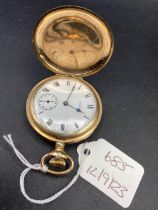 A rolled gold WALTHAM hunter pocket watch with seconds dial cracked glass W/O