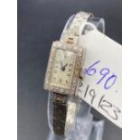 A GOOD WHITE GOLD DIAMOND SET LADIES WRIST WATCH WITH INTEGRAL LINK STRAP ALL 9CT 23.7 GMS INC.