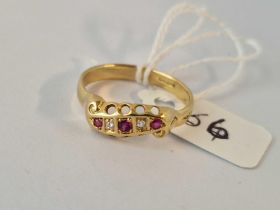 A Victorian ruby and diamond gypsy set ring 18ct gold size P 2.6 gms