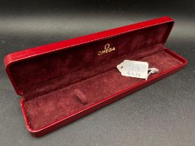 A red OMEGA watch box