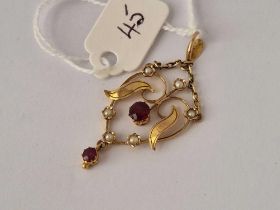 A antique garnet and pearl pendant 9ct