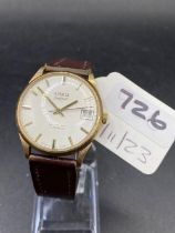 A gents ROAMER wrist watch 9ct with seconds sweep and date aperture