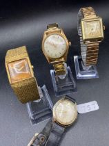 A GRUEN oblong faced wrist watch together with MIRAX and two others