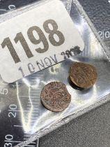 Two tiny Eastern copper coins