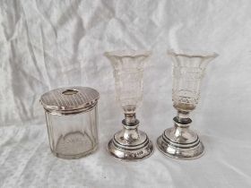 A pair of silver mounted and cut glass vases and a hair tidy