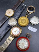 A bag of vintage watches