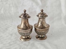 A pair of half fluted baluster shaped peppers, Birmingham 1892