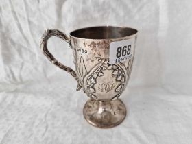 A Victorian Christening mug embossed with panels of Lilly of the Valley, 5" high, London 1857 by SH,