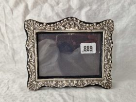 A photo frame with embossed border, 5.5" high, Birmingham 1971