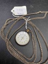 A ladies silver fob watch on chain