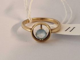 A blue topaz ring 14ct gold size R 2.8 gms