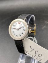 A silver trench watch