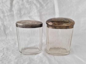 Two plain oval top jars with glass bodies, London 1904