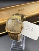 A oblong faced gents AVIA watch with date aperture in original box