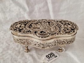A good Edwardian jewellery box, the hinged top decorated with a coaching scene on four claw feet,