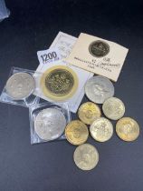 4 x UK £5 coins and 7 x £2 coins